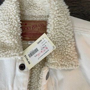 White jean jacket, fur lined